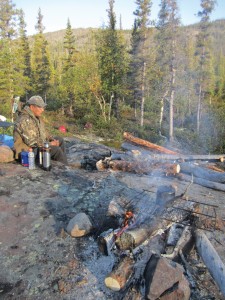 Noel Michel of Lutsel K’e takes a break during a prospecting trip near Great Bear Lake. Photo courtesy of DEMCo. LP.