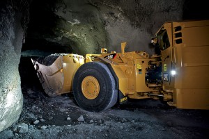A Cat LHD works deep underground and far from the operators located safely at a command centre in a different part of the mine.