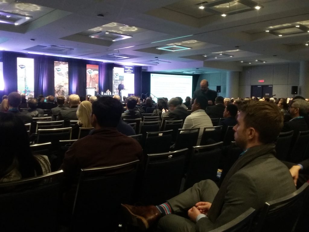 Paul Robinson, a director at CRU Group, speaks at the Prospectors and Developers Association of Canada convention in Toronto. Credit: Canadian Mining Journal