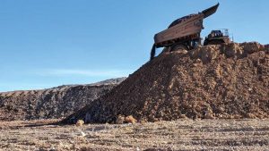 A haul truck placing ore on the leach pad at Fiore Gold’s Pan gold mine in Nevada. Credit: Fiore Gold.