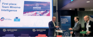 Jake McGregor, COO of Minerva Intelligence accepting first prize for the Helsinki Challenge in 2019. Minerva’s geohazard division designed an application identifying areas in Veneto, Italy, that are susceptible to landslides. Credit: Minerva Intelligence
