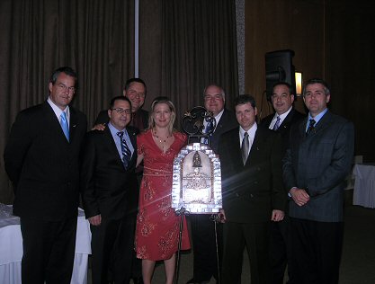 Representatives of Xstrata Nickel's Raglan mine (Francis Beauvais, Gilles Ferlatte, Joel Page, Sophie Bergeron, Mario Julien, Pierre Barrette, Yvon Pronovost and Terry Mallinson) accept the John T. Ryan trophy at the Mining Association of Quebec annual meeting in Bromont, Quebec, June 14, 2009.