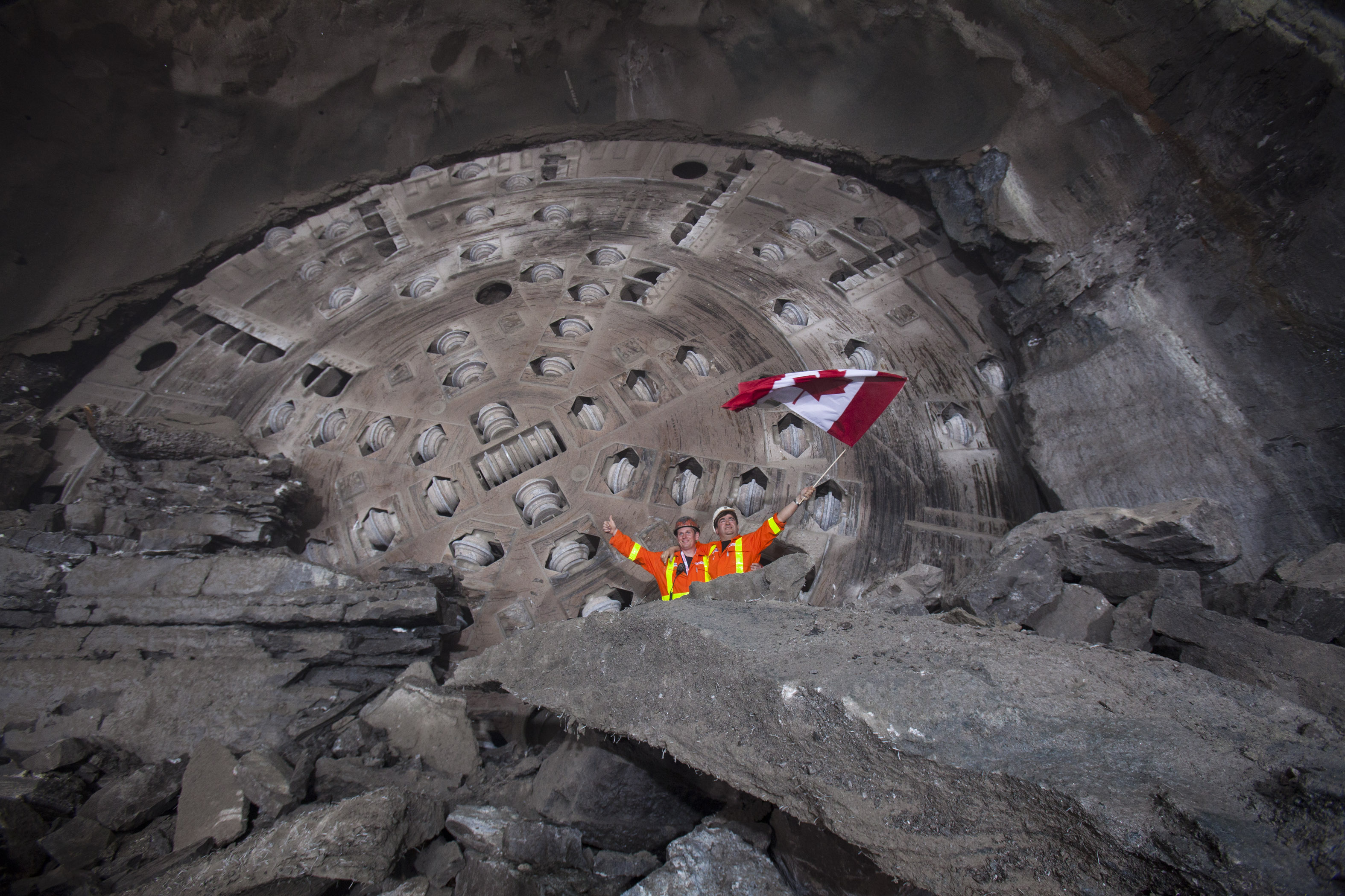 Two of the crew celebrate Big Becky's breakthrough under Niagara Falls, ON. (Photo: Ontario Power Generation)