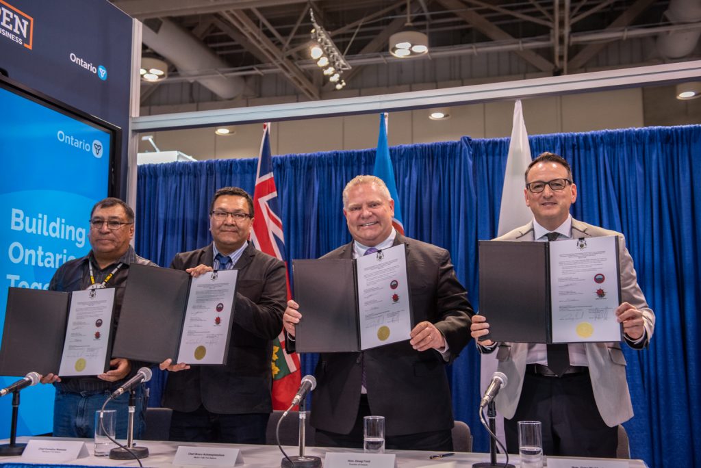 Webequie First Nation Chief Cornelius Wabasse, Marten Falls First Nation Chief Bruce Achneepineskum, Ontario Premier Doug Ford, and Energy, Northern Development and Mines and Indigenous Affairs Minister Greg Rickford at PDAC. Credit: Government of Ontario