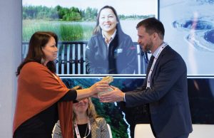 Dawn Madabhee Leach, general manager of Waubetek, and Rio Tinto’s Richard Storrie, president and CEO of the Diavik mine, exchange a gift at the Canada 2020 Annual Indigenous Economic Development Forum. Credit: Rio Tinto